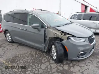 2021 Chrysler Pacifica Touring L with VIN 2C4RC1BG0MR543634, listed as a IAAI auction lot 41513467 with 148,010 mi miles and . Bid and sale history available at DreamBid. Image 1.