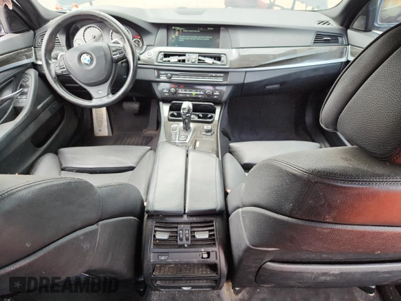 2013 BMW 5 Series 550i xDrive with VIN WBAFU9C55DDY72065, listed as a Copart auction lot 63023675 with 117,592 mi miles and Salvage title. Bid and sale history available at DreamBid. Image 8.