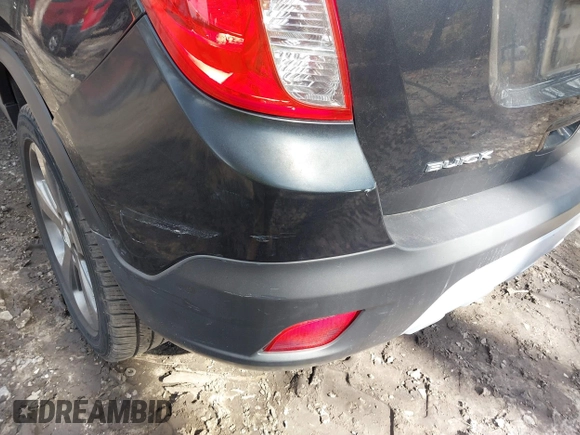 2014 Buick Encore Convenience with VIN KL4CJBSB1EB572110, listed as a IAAI auction lot 41659786 with 101,284 mi miles and . Bid and sale history available at DreamBid. Image 6.
