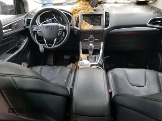 2015 Ford Edge Titanium z VIN 2FMPK4K9XFBB74740, wystawiony jako Copart lot #55529335 z przebiegiem 155 605 mil mil oraz Szkoda całkowita • Salvage title. Historia ofert i sprzedaży dostępna na DreamBid. Obrazek 8.