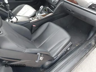 2015 BMW 4 Series 435i with VIN WBA3T3C51FP939555, listed as a IAAI auction lot 41815749 with 57,480 mi miles and . Bid and sale history available at carsss.com. Image 5.