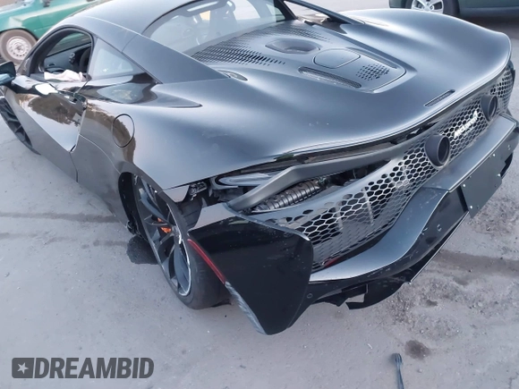2023 McLaren Artura z VIN SBM16AEA4PW001449, wystawiony jako IAAI lot #41347791 z przebiegiem 4703 mil mil oraz . Historia ofert i sprzedaży dostępna na DreamBid. Obrazek 6.