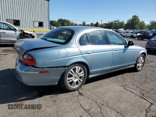 2003 Jaguar S-Type z VIN SAJEA01U53HM73131, wystawiony jako Copart lot #73430914 z przebiegiem 72 730 mil mil oraz Szkody całkowita. Historia ofert i sprzedaży dostępna na DreamBid. Obrazek 3.