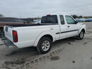 2001 Nissan Frontier XE with VIN 1N6DD26S91C398560, listed as a Copart auction lot 87893925 with 184,831 mi miles and Salvage title. Bid and sale history available at DreamBid. Image 3.