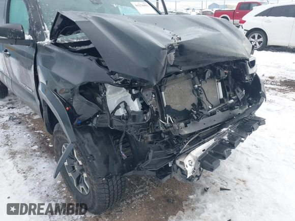 2023 Toyota Tacoma SR5 z VIN 3TMDZ5BN3PM169160, wystawiony jako IAAI lot #41276992 z przebiegiem 5 228 mil mil oraz . Historia ofert i sprzedaży dostępna na DreamBid. Obrazek 6.