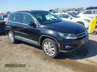 2012 Volkswagen Tiguan SE z VIN WVGAV7AX9CW544147, wystawiony jako IAAI lot #41841625 z przebiegiem 138 944 mil mil oraz . Historia ofert i sprzedaży dostępna na DreamBid. Obrazek 1.
