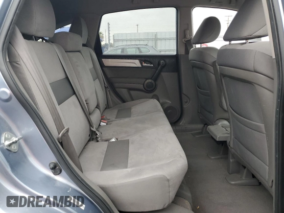 2011 Honda CR-V SE z VIN JHLRE4H42BC020164, wystawiony jako Copart lot #53682635 z przebiegiem 106 667 mil mil oraz Szkoda całkowita • Salvage title. Historia ofert i sprzedaży dostępna na DreamBid. Obrazek 11.