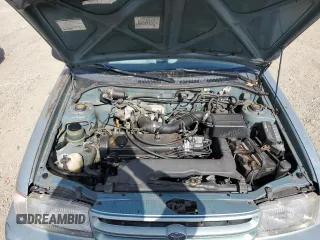 1994 Toyota Tercel DX z VIN JT2EL43T6R0457122, wystawiony jako Copart lot #54426595 z przebiegiem 201 177 mil mil oraz Czysty tytuł • Clean title. Historia ofert i sprzedaży dostępna na DreamBid. Obrazek 11.