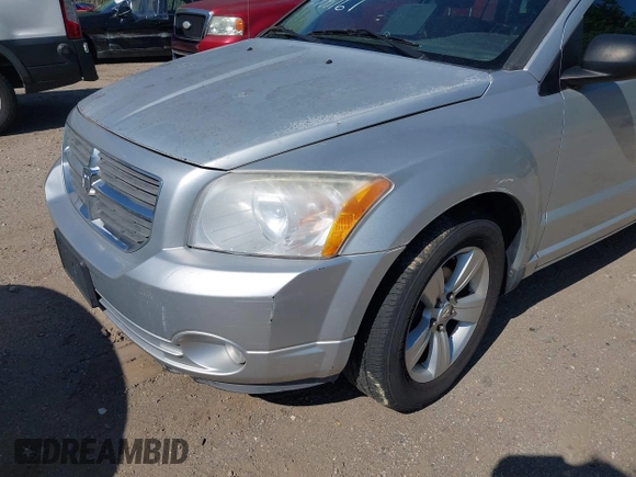 2012 Dodge Caliber SXT z VIN 1C3CDWDA4CD535843, wystawiony jako IAAI lot #42306769 z przebiegiem 188 240 mil mil oraz . Historia ofert i sprzedaży dostępna na DreamBid. Obrazek 6.