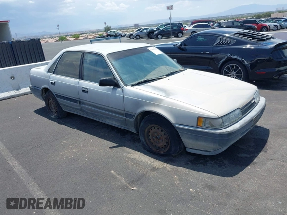1988 Mazda 626 z VIN JM1GD2221J1550574, wystawiony jako IAAI lot #42415062 z przebiegiem 190 747 mil mil oraz . Historia ofert i sprzedaży dostępna na DreamBid. Obrazek 1.