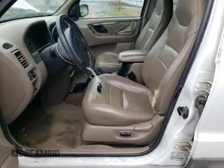 2001 Ford Escape XLT with VIN 1FMYU04181KC55393, listed as a Copart auction lot 76321074 with 223,327 mi miles and Salvage Title. Bid and sale history available at carsss.com. Image 7.