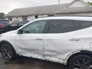 2018 Hyundai Santa Fe Ultimate with VIN 5NMZW4LA3JH088349, listed as a IAAI auction lot 42168983 with 66,884 mi miles and . Bid and sale history available at DreamBid. Image 14.