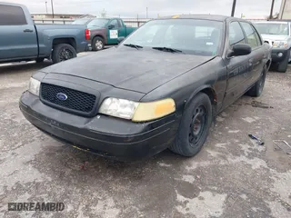 2011 Ford Crown Victoria with VIN 2FABP7AV4BX166216, listed as a IAAI auction lot 41268754 with 205,308 mi miles. Bid and sale history available at carsss.com. Image 22.