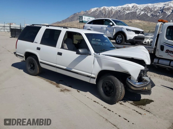 1999 GMC Yukon with VIN 1GKEC13R4XJ809507, listed as a Copart auction lot 50922655 with 227,923 mi miles and Salvage Title. Bid and sale history available at carsss.com. Image 4.