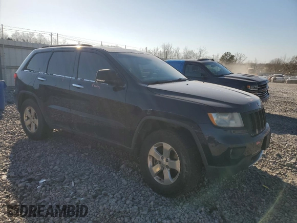 2013 Jeep Grand Cherokee Overland with VIN 1C4RJFCT8DC523252, listed as a Copart auction lot 48706965 with 173,325 mi miles and Salvage Title. Bid and sale history available at carsss.com. Image 4.