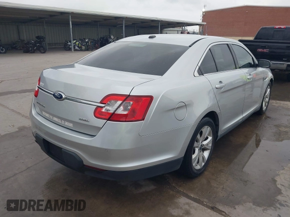 2011 Ford Taurus SEL with VIN 1FAHP2EW1BG117660, listed as a IAAI auction lot 42133767 with 204,965 mi miles and . Bid and sale history available at DreamBid. Image 4.