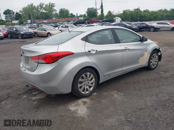 2012 Hyundai Elantra GLS with VIN KMHDH4AEXCU400457, listed as a IAAI auction lot 42395614 with 168,910 mi miles and . Bid and sale history available at DreamBid. Image 4.