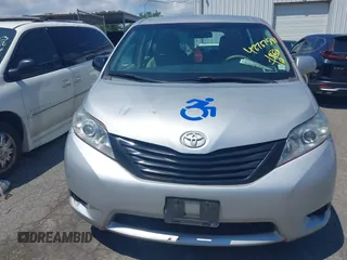 2014 Toyota Sienna L with VIN 5TDZK3DC9ES518653, listed as a IAAI auction lot 42767591 with 261,730 mi miles and . Bid and sale history available at DreamBid. Image 12.