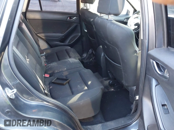 2016 Mazda CX-5 Touring with VIN JM3KE4CY0G0751040, listed as a IAAI auction lot 41290780 with 136,689 mi miles. Bid and sale history available at carsss.com. Image 8.