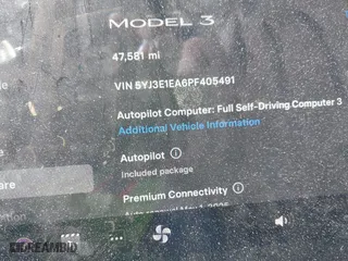 2023 Tesla Model 3 with VIN 5YJ3E1EA6PF405491, listed as a IAAI auction lot 41851797 with 47,581 mi miles. Bid and sale history available at carsss.com. Image 16.