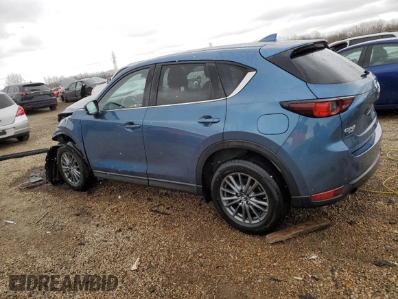 2017 Mazda CX-5 Touring z VIN JM3KFBCL2H0129000, wystawiony jako Copart lot #52107005 z przebiegiem 55 411 mil mil oraz Szkody całkowita. Historia ofert i sprzedaży dostępna na DreamBid. Obrazek 2.