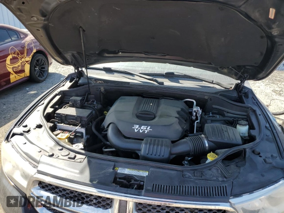 2013 Dodge Durango SXT z VIN 1C4RDHAG4DC617038, wystawiony jako Copart lot #50887945 z przebiegiem 219 287 mil mil oraz Szkoda całkowita • Salvage title. Historia ofert i sprzedaży dostępna na DreamBid. Obrazek 12.