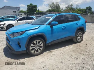 2021 Toyota RAV4 XLE Premium with VIN 2T3C1RFV1MW143428, listed as a Copart auction lot 57633945 with 28,461 mi miles and Salvage title. Bid and sale history available at DreamBid. Image 1.