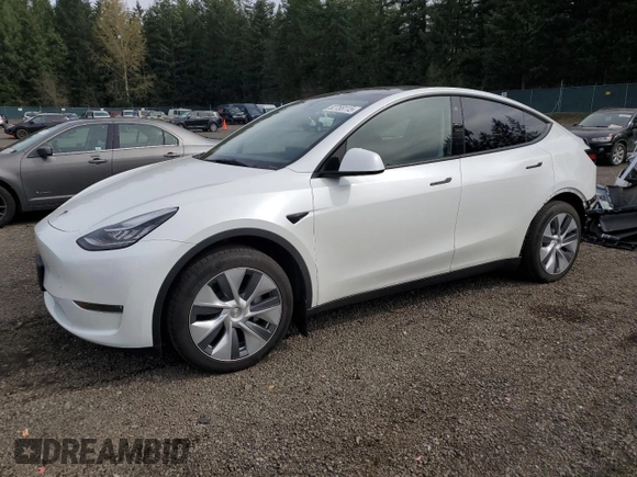 2023 Tesla Model Y Long Range with VIN 7SAYGDEE6PA101291, listed as a Copart auction lot 52758115 with 7,250 mi miles and Salvage Title. Bid and sale history available at DreamBid. Image 1.