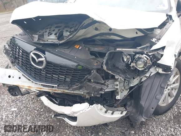 2014 Mazda CX-5 Sport with VIN JM3KE4BE3E0300849, listed as a IAAI auction lot 41942418 with 144,310 mi miles. Bid and sale history available at carsss.com. Image 6.