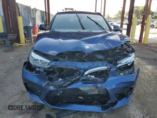2020 BMW X4 M Competition z VIN 5YMUJ0C0XL9B03463, wystawiony jako Copart lot #73372744 z przebiegiem Nie podano mil oraz Szkoda całkowita • Salvage title. Historia ofert i sprzedaży dostępna na DreamBid. Obrazek 5.