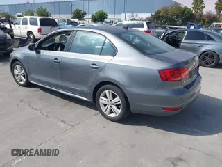 2013 Volkswagen Jetta Hybrid SE with VIN 3VW637AJ3DM305798, listed as a IAAI auction lot 42736297 with 156,972 mi miles and . Bid and sale history available at DreamBid. Image 3.
