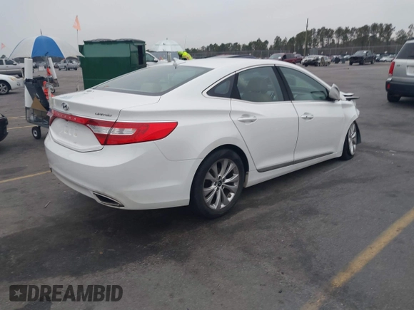 2014 Hyundai Azera Limited z VIN KMHFH4JG7EA365603, wystawiony jako IAAI lot #41297919 z przebiegiem 83 690 mil mil oraz . Historia ofert i sprzedaży dostępna na DreamBid. Obrazek 4.
