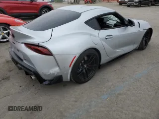 2021 Toyota GR Supra 3.0 with VIN WZ1DB0C0XMW039660, listed as a Copart auction lot 86909354 with 30,272 mi miles and Salvage Title. Bid and sale history available at carsss.com. Image 3.