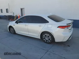 2021 Toyota Corolla Hybrid LE with VIN JTDEAMDE2MJ030570, listed as a Copart auction lot 50530625 with 80,249 mi miles and Salvage Title. Bid and sale history available at carsss.com. Image 2.
