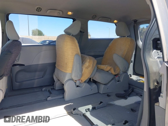 2012 Toyota Sienna with VIN 5TDZK3DC9CS261944, listed as a IAAI auction lot 41885359 with 184,918 mi miles. Bid and sale history available at carsss.com. Image 8.