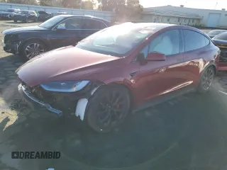 2023 Tesla Model X Plaid with VIN 7SAXCBE60PF431032, listed as a Copart auction lot 86601394 with 12,039 mi miles and Salvage Title. Bid and sale history available at DreamBid. Image 1.