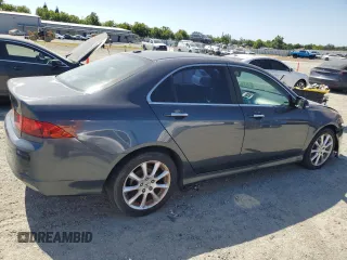 2007 Acura TSX Navi with VIN JH4CL96927C011121, listed as a Copart auction lot 59056935 with 193,982 mi miles and Salvage title. Bid and sale history available at DreamBid. Image 3.