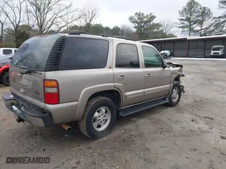 2002 Chevrolet Tahoe LT with VIN 1GNEC13Z22J256805, listed as a IAAI auction lot 41302460 with 249,578 mi miles. Bid and sale history available at carsss.com. Image 4.