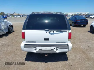2001 Chevrolet Blazer LT z VIN 1GNCS13W712122865, wystawiony jako IAAI lot #41997035 z przebiegiem 161 862 mil mil oraz . Historia ofert i sprzedaży dostępna na DreamBid. Obrazek 16.