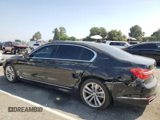 2016 BMW 7 Series 740i with VIN WBA7E2C59GG547804, listed as a Copart auction lot 68620463 with 122,937 mi miles. Bid and sale history available at carsss.com. Image 2.