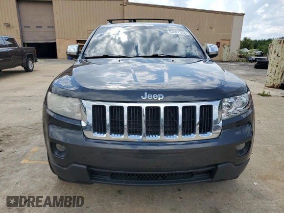 2011 Jeep Grand Cherokee Laredo with VIN 1J4RR4GG8BC587101, listed as a Copart auction lot 64027365 with 169,544 mi miles and Clean title. Bid and sale history available at DreamBid. Image 5.