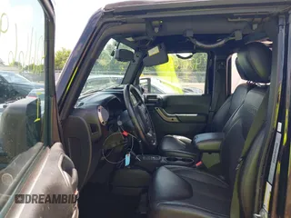 2017 Jeep Wrangler Unlimited Sahara with VIN 1C4BJWEGXHL520182, listed as a IAAI auction lot 42616692 with 88,169 mi miles and . Bid and sale history available at DreamBid. Image 5.