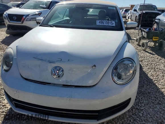 2014 Volkswagen Beetle 1.8T with VIN 3VW517AT4EM818949, listed as a Copart auction lot 49615915 with 103,682 mi miles and Salvage title. Bid and sale history available at DreamBid. Image 5.