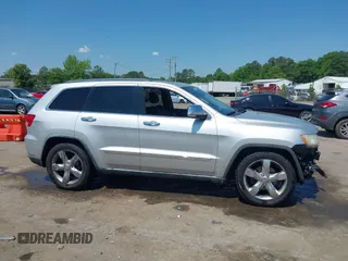 2011 Jeep Grand Cherokee Overland with VIN 1J4RR6GGXBC526649, listed as a IAAI auction lot 42162327 with 185,129 mi miles and . Bid and sale history available at DreamBid. Image 13.