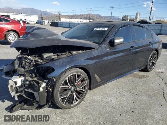 2021 BMW 5 Series M550i xDrive z VIN WBA13BK06MCF92173, wystawiony jako Copart lot #87707035 z przebiegiem Nie podano mil oraz Szkoda całkowita • Salvage title. Historia ofert i sprzedaży dostępna na DreamBid. Obrazek 1.