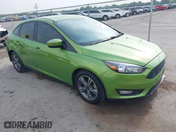 2018 Ford Focus SE z VIN 1FADP3FE5JL222542, wystawiony jako IAAI lot #42265608 z przebiegiem 107 397 mil mil oraz . Historia ofert i sprzedaży dostępna na DreamBid. Obrazek 1.