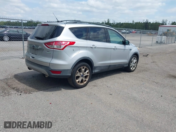 2013 Ford Escape SEL with VIN 1FMCU0H97DUD95194, listed as a IAAI auction lot 42052786 with 145,616 mi miles. Bid and sale history available at carsss.com. Image 4.