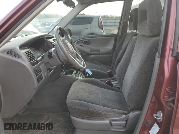 2003 Chevrolet Tracker LT with VIN 2CNBE634136908086, listed as a Copart auction lot 78168894 with 243,614 mi miles and Salvage title. Bid and sale history available at DreamBid. Image 7.