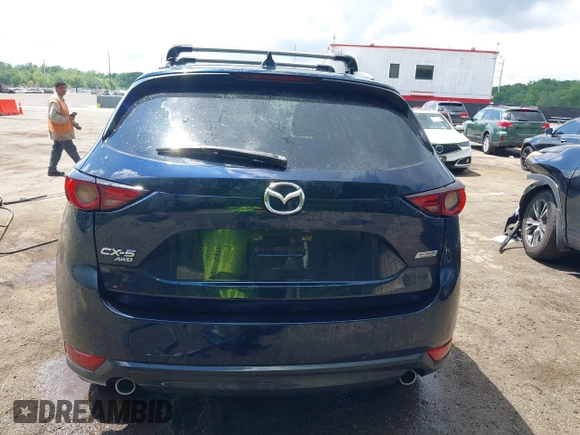 2018 Mazda CX-5 Grand Touring with VIN JM3KFBDM2J0373386, listed as a IAAI auction lot 42200795 with 70,111 mi miles and . Bid and sale history available at DreamBid. Image 17.