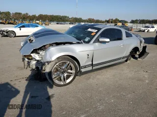 2010 Ford Mustang GT500 with VIN 1ZVBP8JS3A5156425, listed as a Copart auction lot 77348134 with 61,984 mi miles and Salvage Title. Bid and sale history available at carsss.com. Image 1.